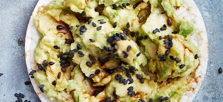 Avocado tamari and black sesame seed rice cake