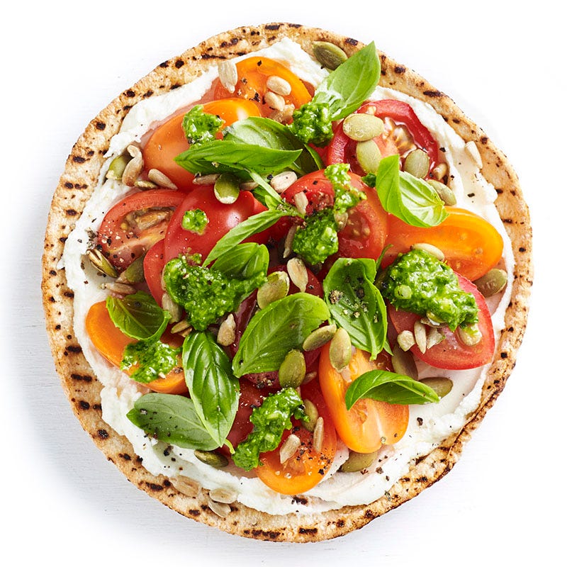 Photo of Fresh tomato, goat’s cheese, basil and seeds pizza by WW