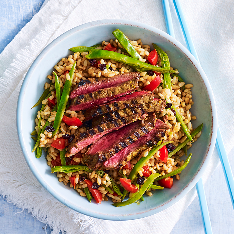 Photo of Turmeric, honey and sesame marinated beef with warm brown rice salad by WW