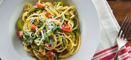 Zucchini noodles with tomato and basil cream sauce