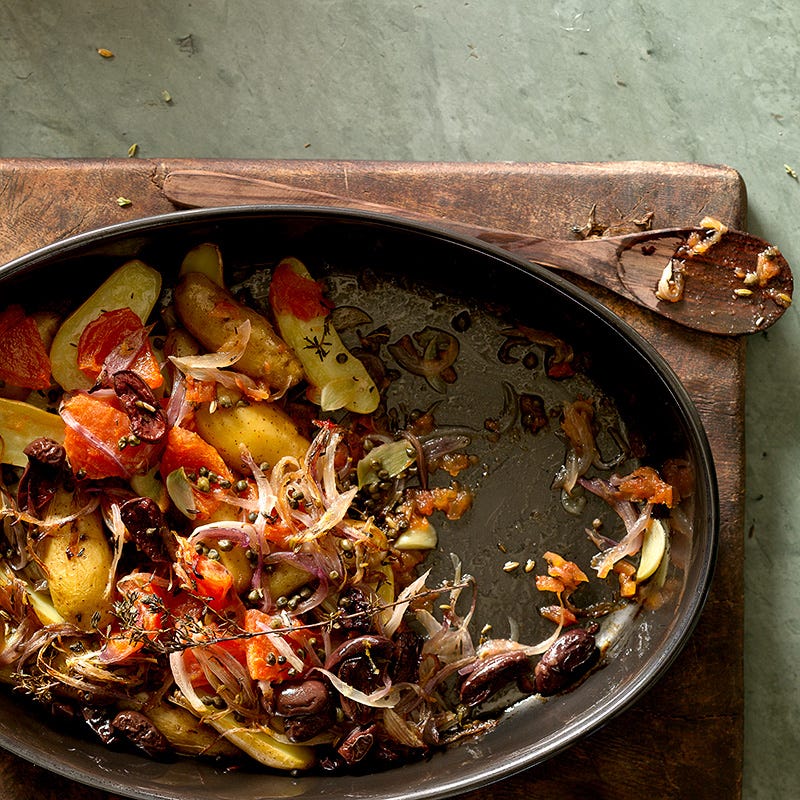 Roasted fingerling potatoes and tomatoes with thyme, olives, and capers
