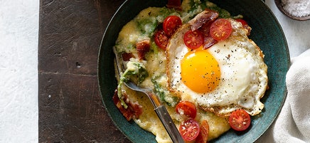 Slow-Cooker Cheese Grits & Greens with an Egg