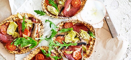 Salami and artichoke pizza
