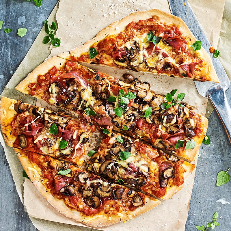 Prosciutto and cheese pizza