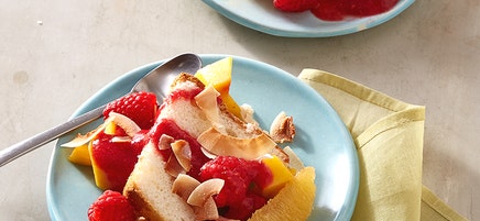 Angel Food Cake with Tropical Fruit Salad and Raspberry Sauce