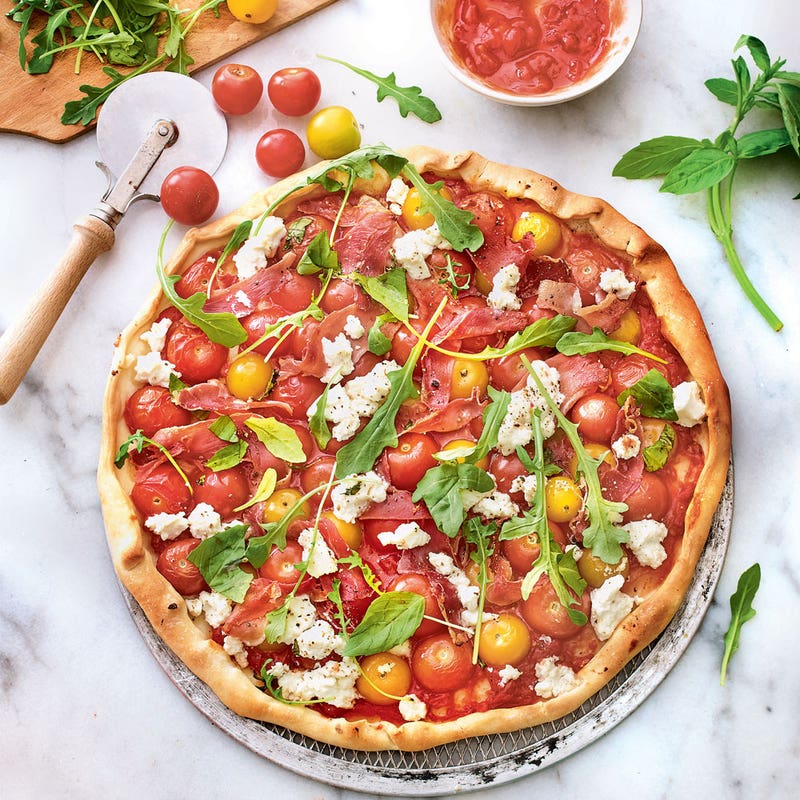 Pizza ricotta, tomates et roquette au Parme