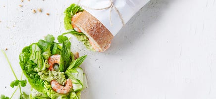 Prawn baguette with spicy avocado & herb salad