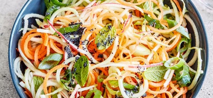 Curly slaw with orange poppy seed dressing