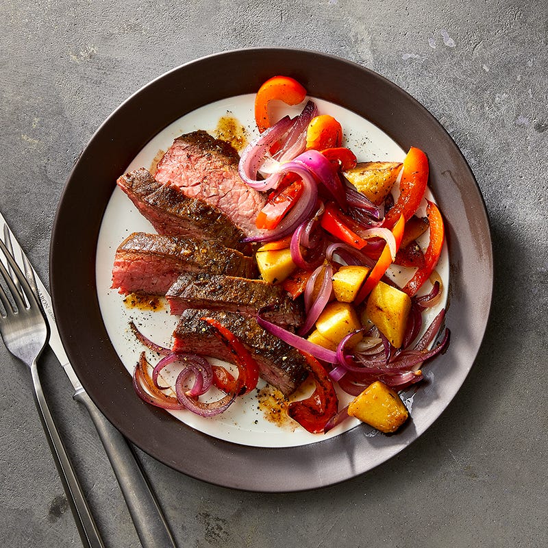 Photo of Spice-rubbed flank steak with roasted veggies by WW