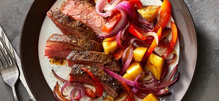 Spice-rubbed flank steak with roasted veggies