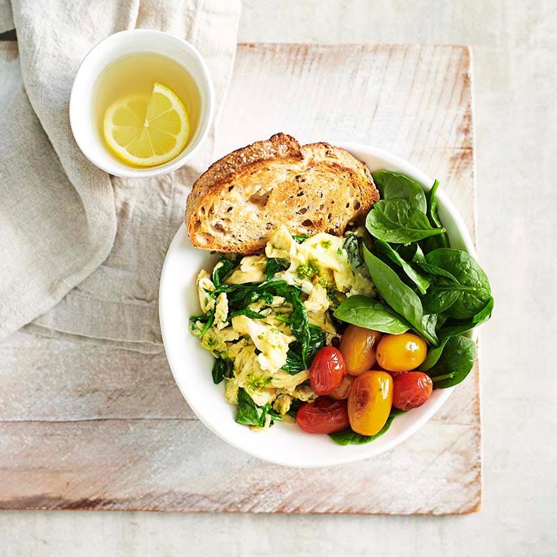 Green eggs with blistered tomatoes