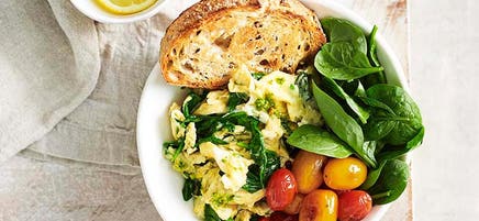 Green eggs with blistered tomatoes