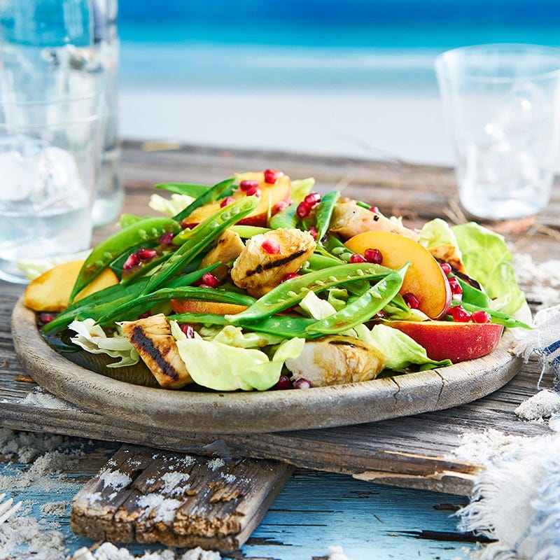 Grilled chicken, peach and herb salad with pomegranate dressing