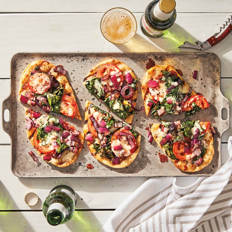 Grilled Swiss chard and tomato pizzas