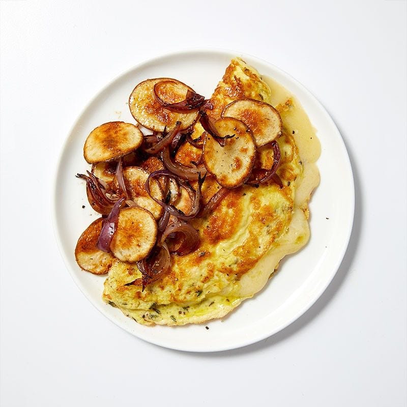 Photo of Roasted potatoes & onions with a Swiss cheese omelet by WW