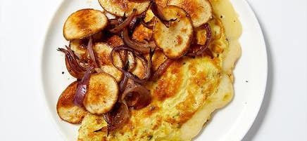 Roasted potatoes & onions with a Swiss cheese omelet