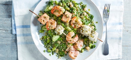 Seafood kebabs with green quinoa salad