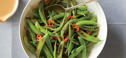 Blistered sugar snap peas with peanut sauce