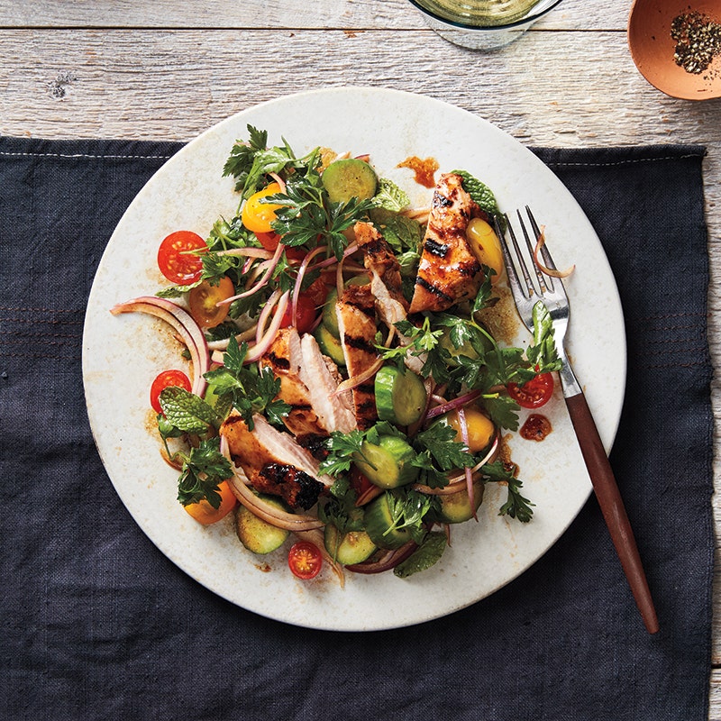 Grilled chicken with cucumber and herb salad