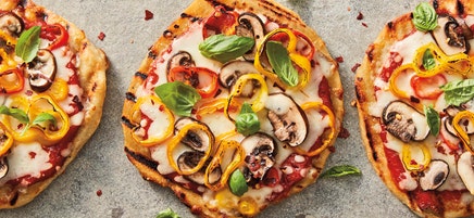 Grilled mushroom and pepper pizzas