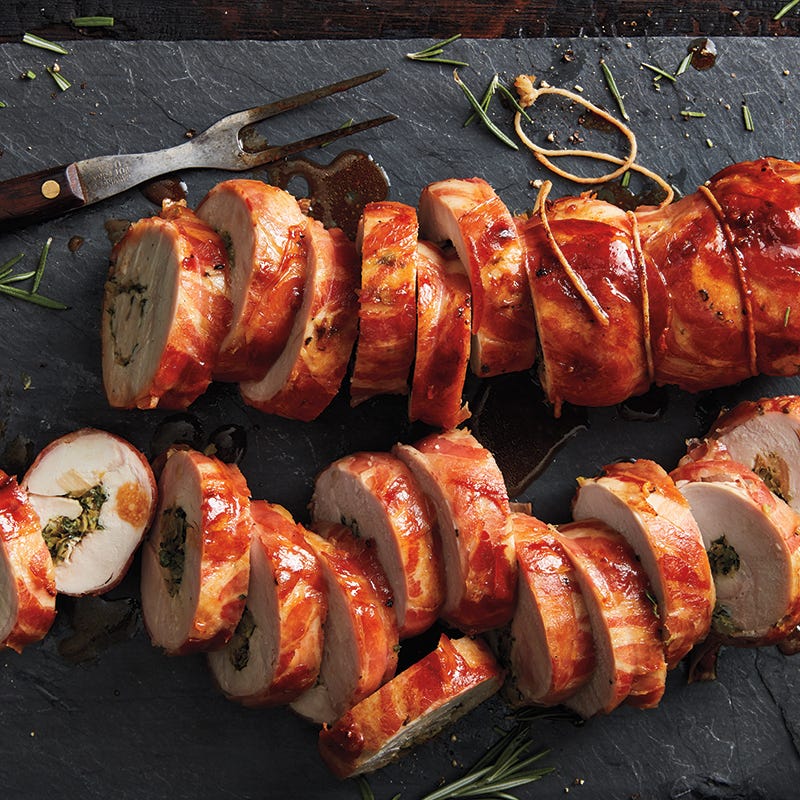 Leek and herb–stuffed bacon-wrapped turkey