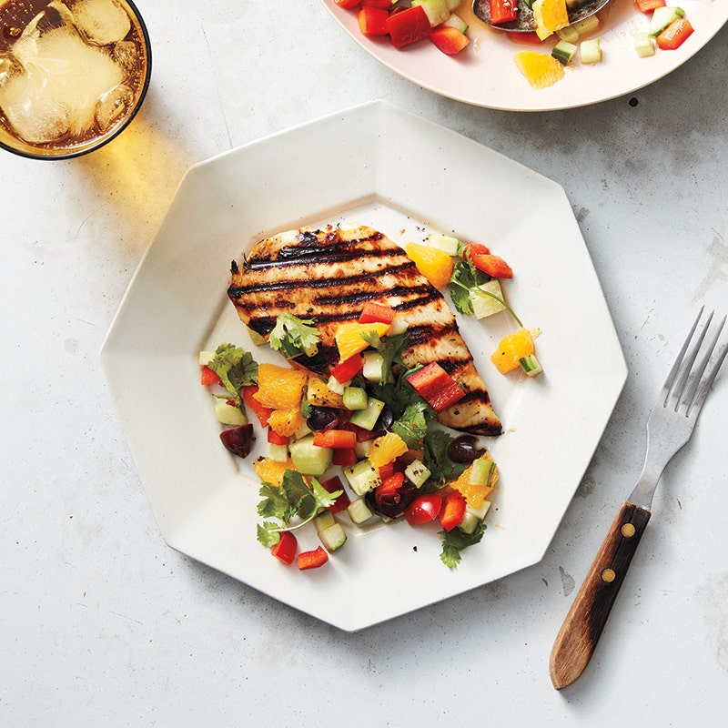 Chicken with cucumber, orange, and olive salad
