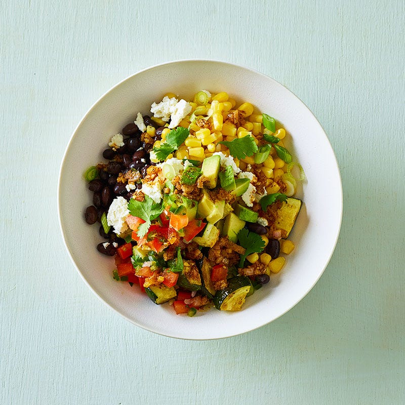 Photo of Mexican black bean, zucchini, and corn bowl with cumin-lime drizzle by WW