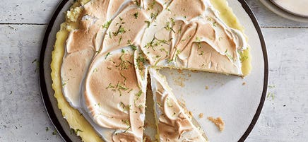 Key lime cheesecake pie with meringue frosting