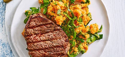Grilled steak with sweet potato and spinach smash