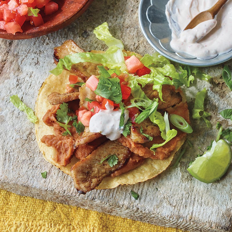 Pork and refried bean tostadas
