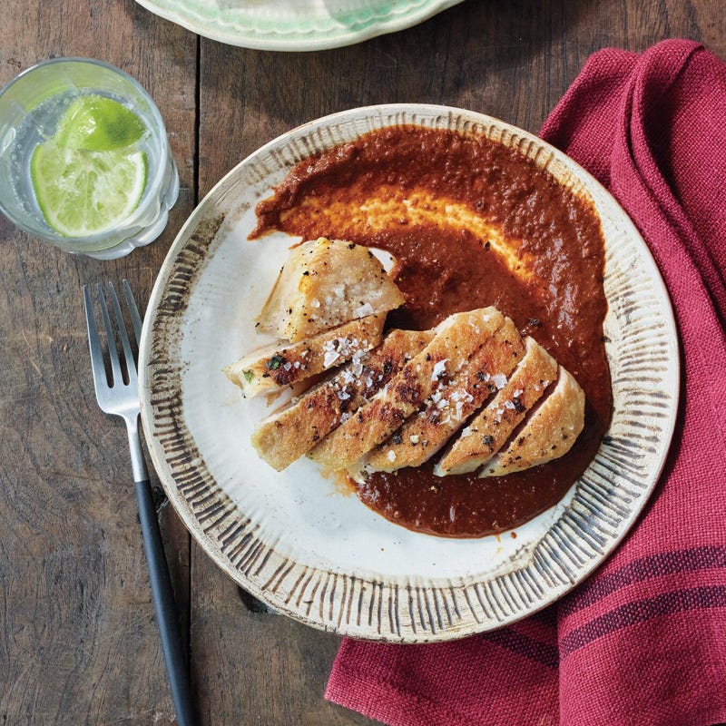 Pork chops with red mole sauce