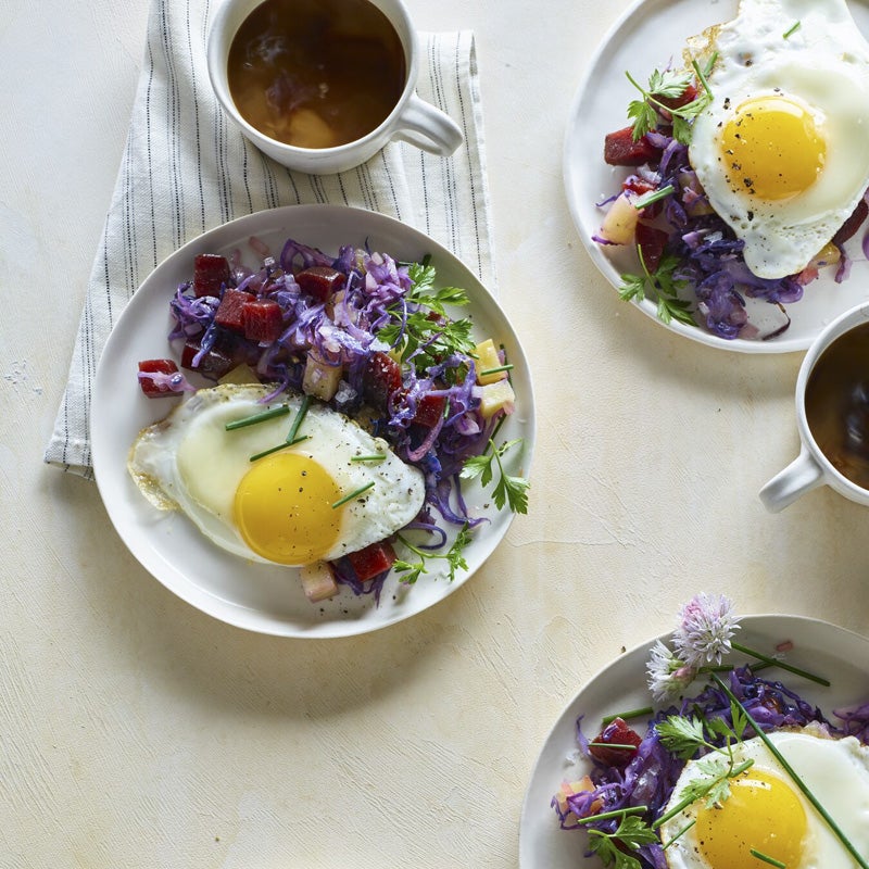 Red flannel hash with sunnyside-up eggs