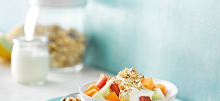 Yoghurt met muesli en meloen