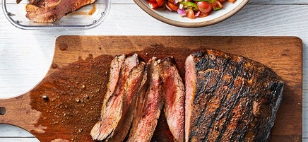 Flank steak with tomato and onion salad