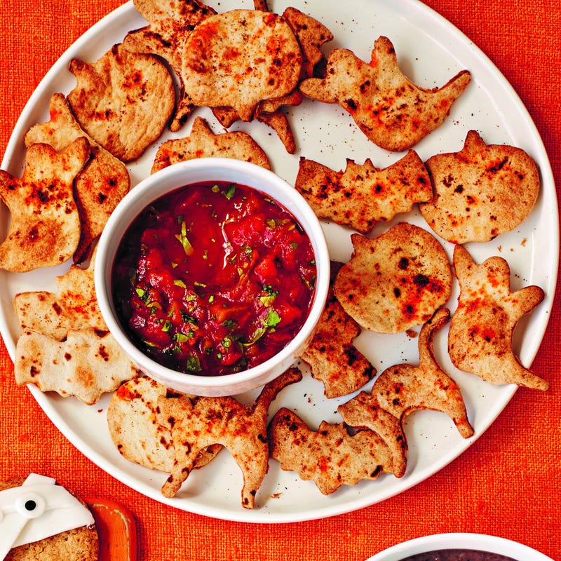 Photo of Spooky tortilla crisps with tomato salsa by WW