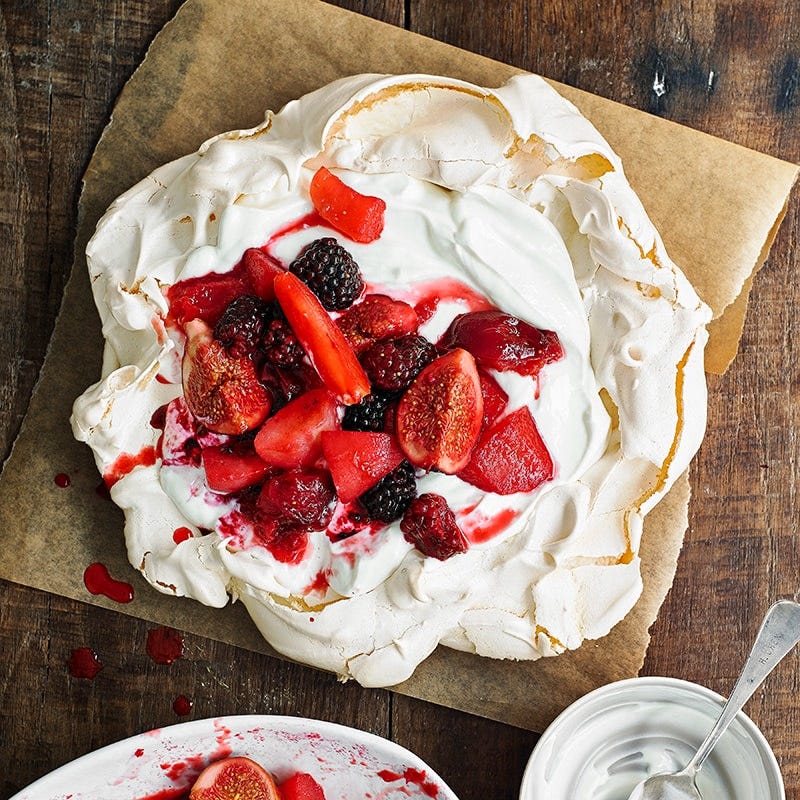 Poached fruit pavlova
