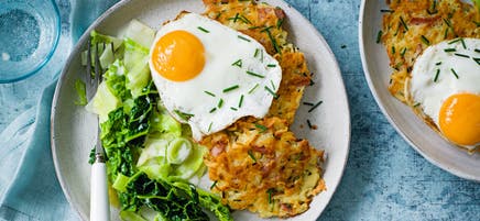 Potato & bacon fritters with fried eggs & greens