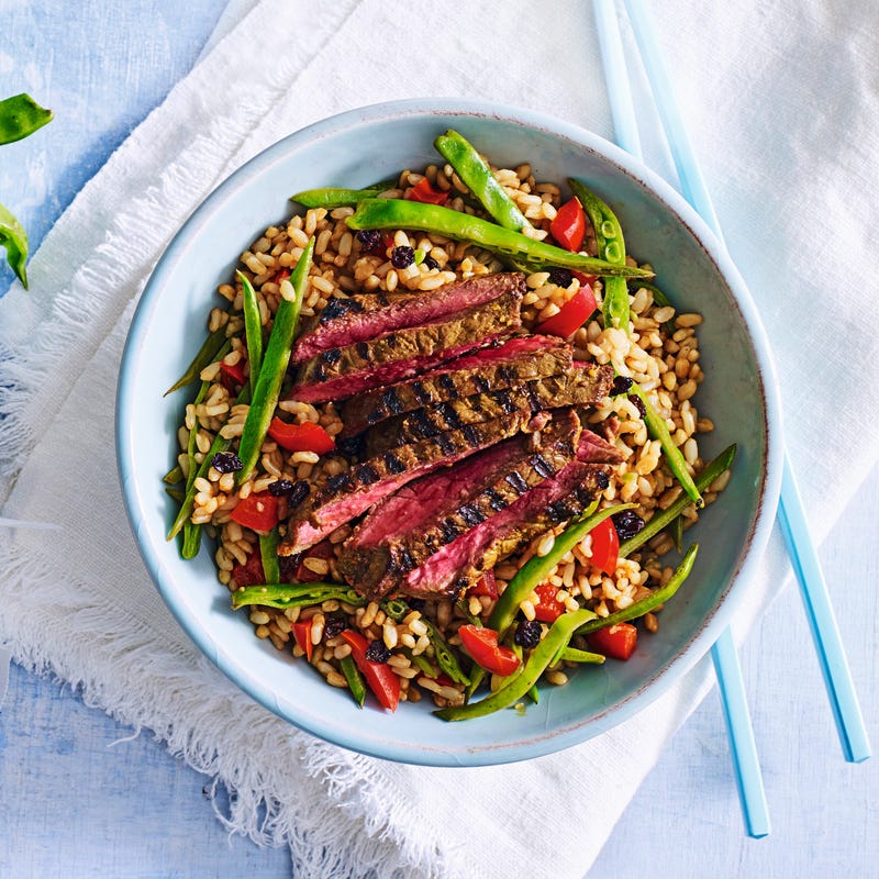 Photo of Turmeric, ginger & honey beef with warm brown rice salad by WW