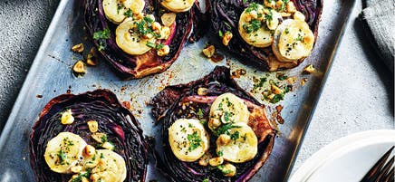 Roast cabbage steaks with goat's cheese