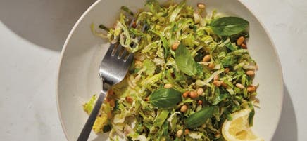 Shredded Brussels sprouts with basil & pine nuts