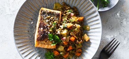 Crispy salmon with warm French lentil salad