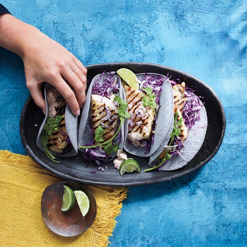 Fish tacos with creamy cilantro sauce