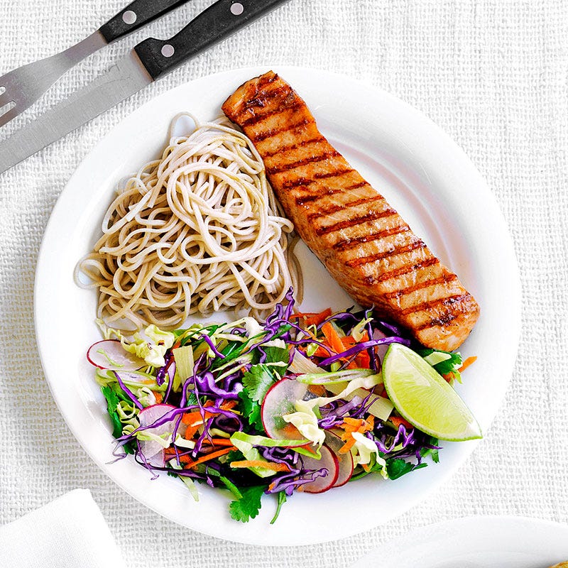 Grilled salmon with soba noodles and Asian slaw