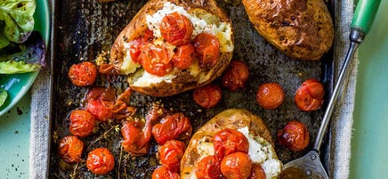 Baked potatoes with ricotta & roasted tomatoes