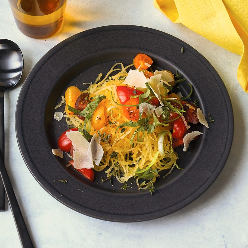 Cherry tomato and basil-topped spaghetti squash