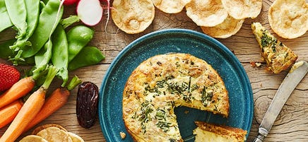 Chip-crusted cheese wheel