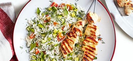 Zesty chicken skewers with rice salad