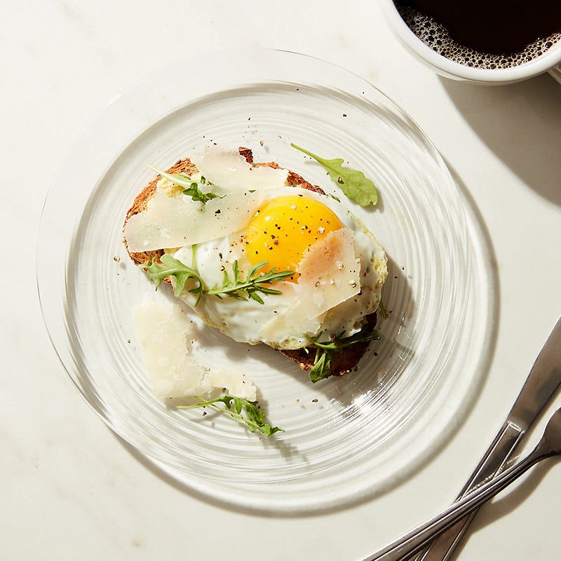 Photo of Cat Cora’s artichoke spread on rye bread with an egg and shaved parmesan by WW