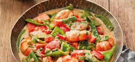 Curry met pindakaas en pittige garnalen