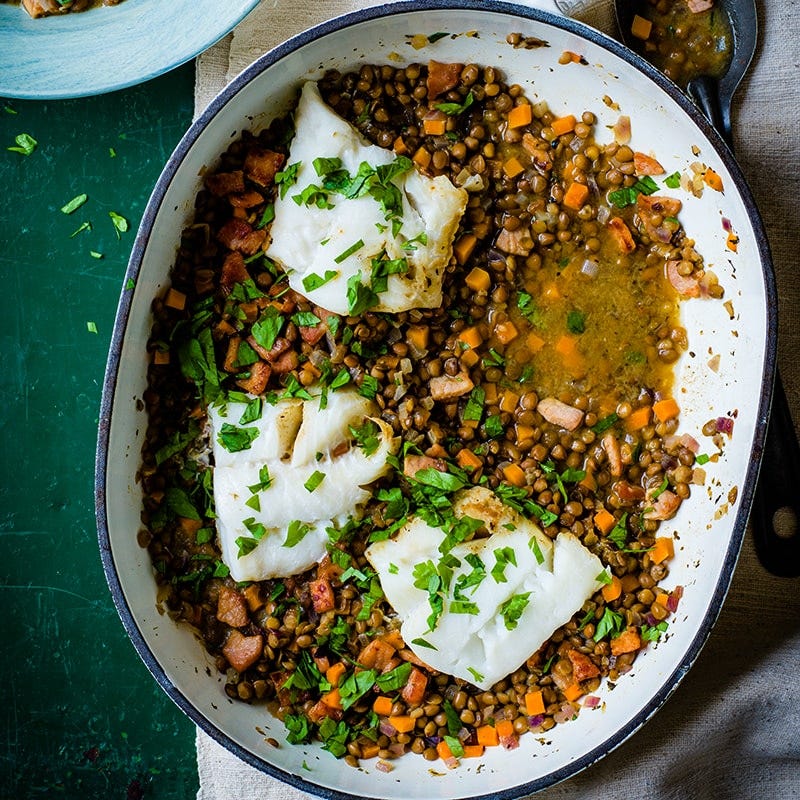 Fish with braised bacon lentils